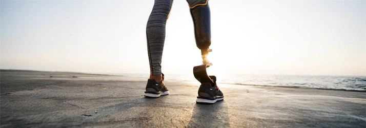 A person with a prosthetic leg.